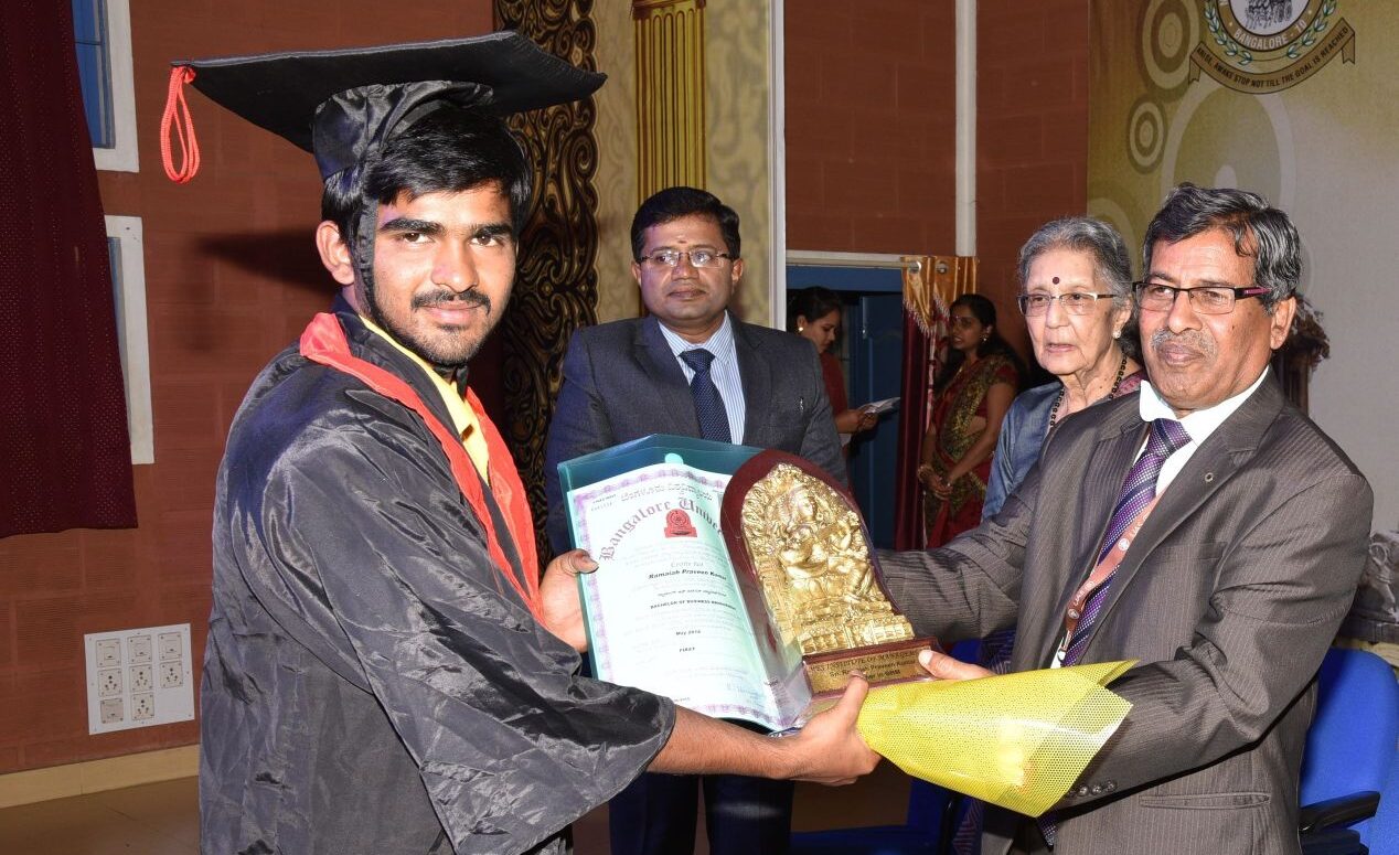 Mr. Ramaiah Praveen Kumar, B.B.M, 8th rank holder receiving convocation certificate from Dr. H Shivanna, Vice Chancellor, University of Agricultural science at Graduation day on 13th Feb. 2016